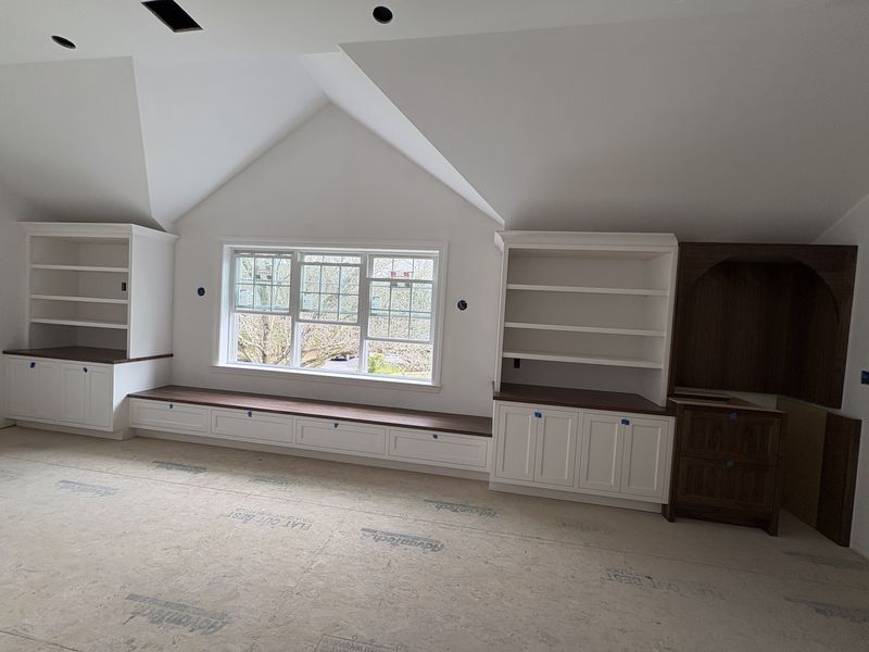 Custom built-in bookcases and window seat by Tavares Carpenting