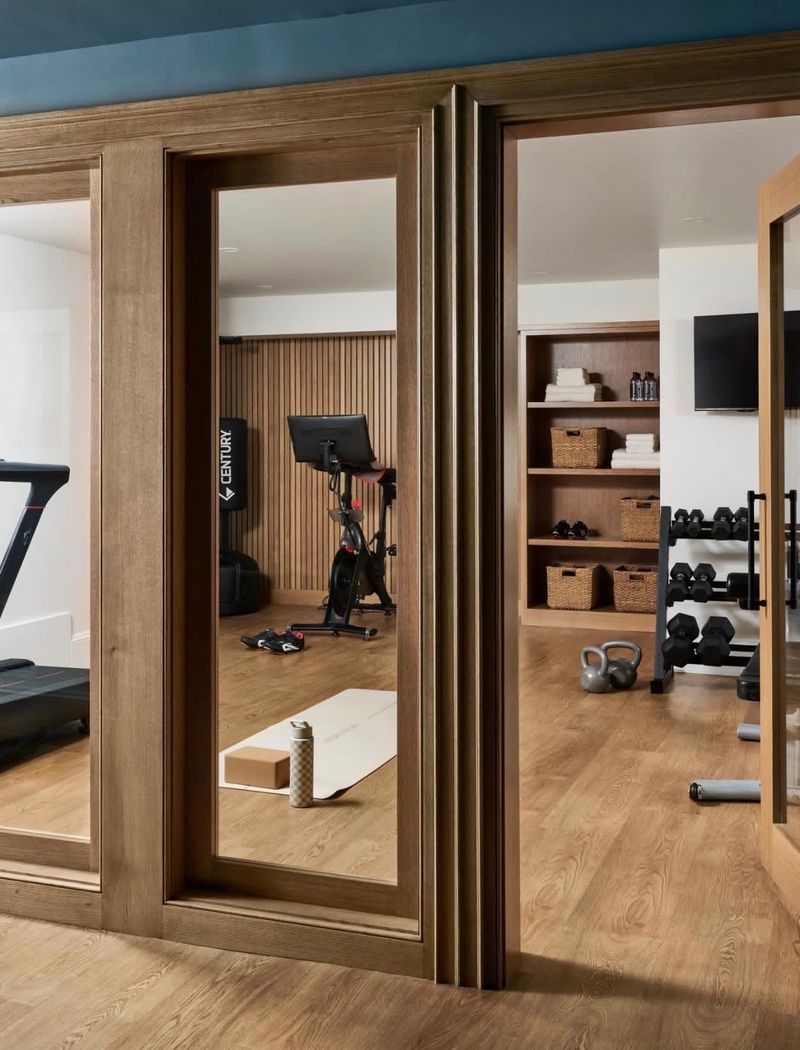 Custom white oak millwork and mirrored pocket doors